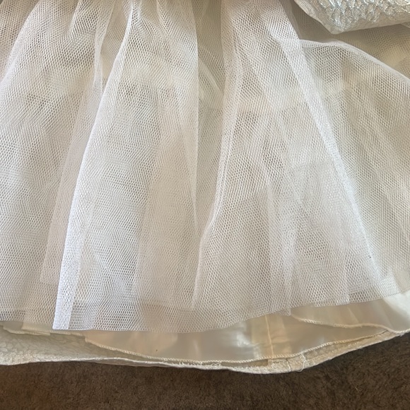 American Princess girls sleeveless dress with
pearl detail and tie in the back. - Picture 7 of 7